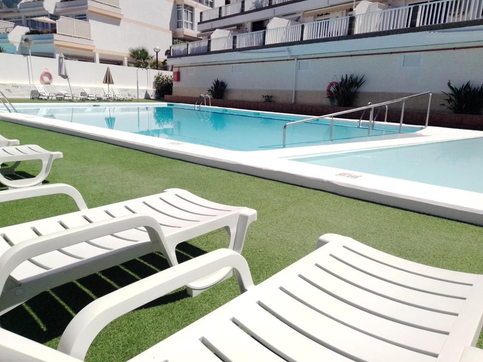 Property building, Living room, Swimming pool