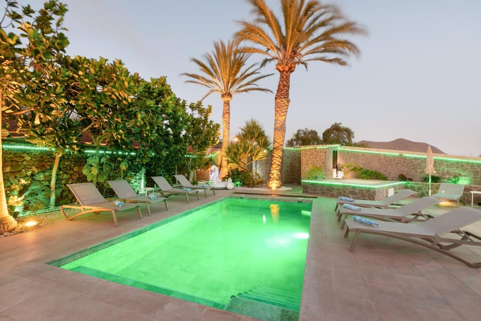 Property building, Living room, Swimming pool