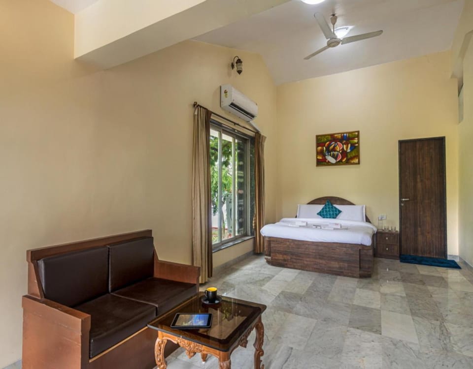 Bed, Photo of the whole room, Seating area, Bedroom, fireplace, air conditioner
