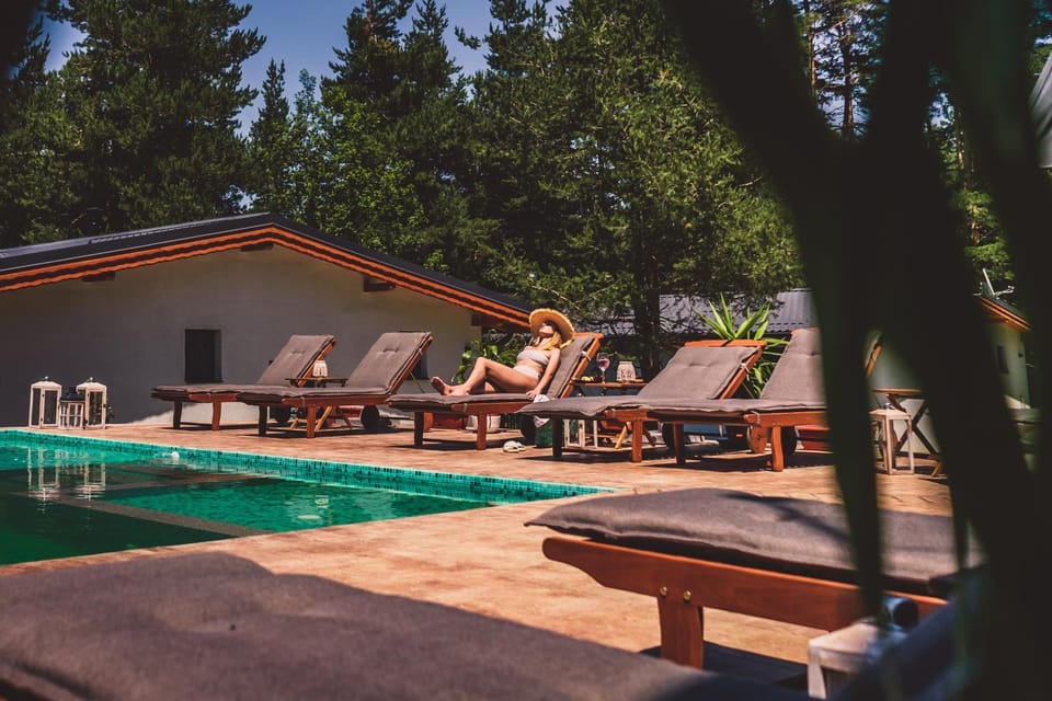 Patio, Day, Natural landscape, Pool view, Swimming pool, sunbed