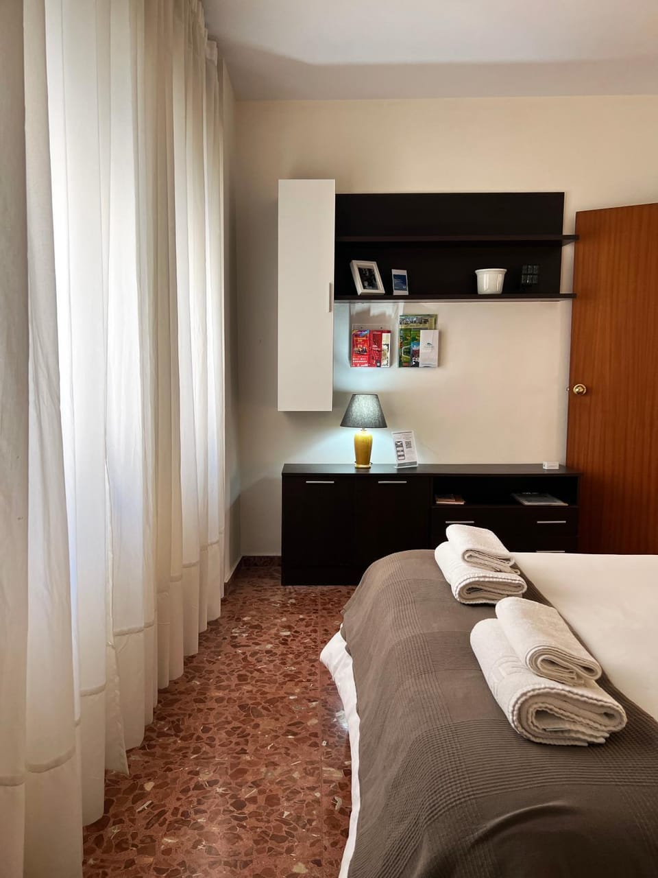Bed, Bedroom, Inner courtyard view, towels, air conditioner