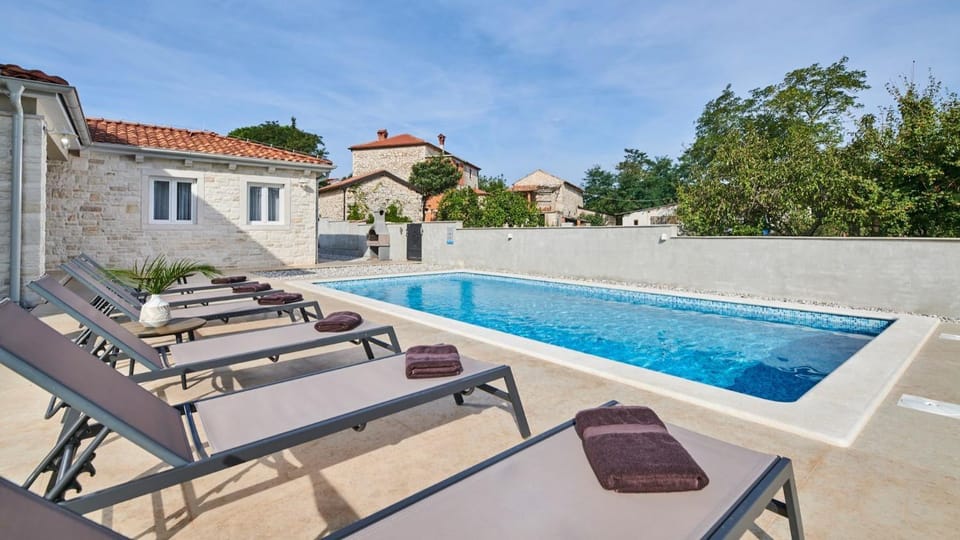 Property building, BBQ facilities, Garden, Seating area, Swimming pool