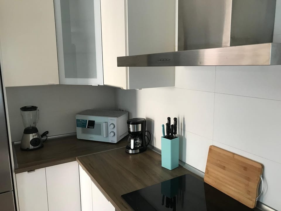 Kitchen or kitchenette, stove, toaster