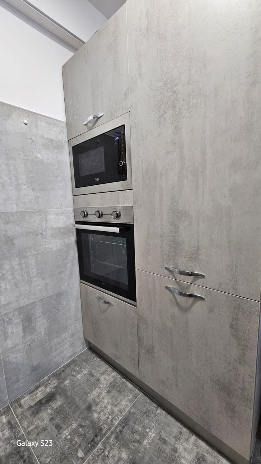 Kitchen or kitchenette, microwave, oven