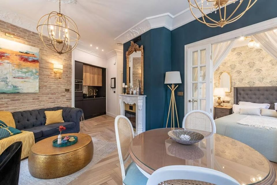 Bed, Living room, Seating area, Bedroom