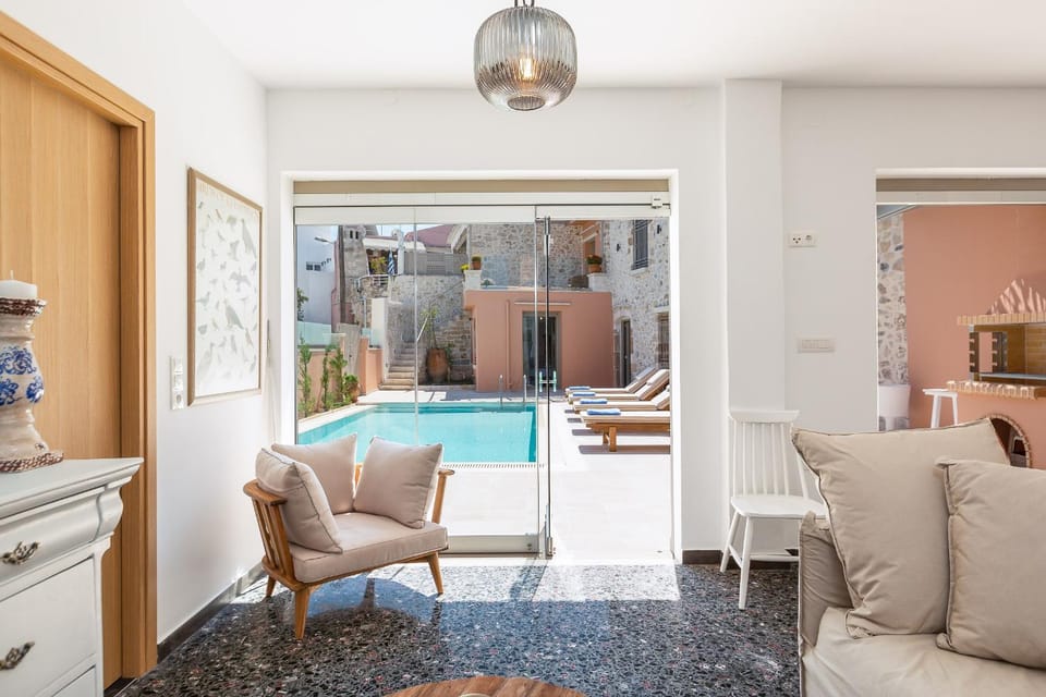 Living room, Seating area, Pool view