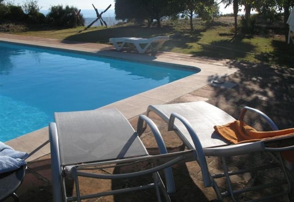 Property building, Living room, Swimming pool