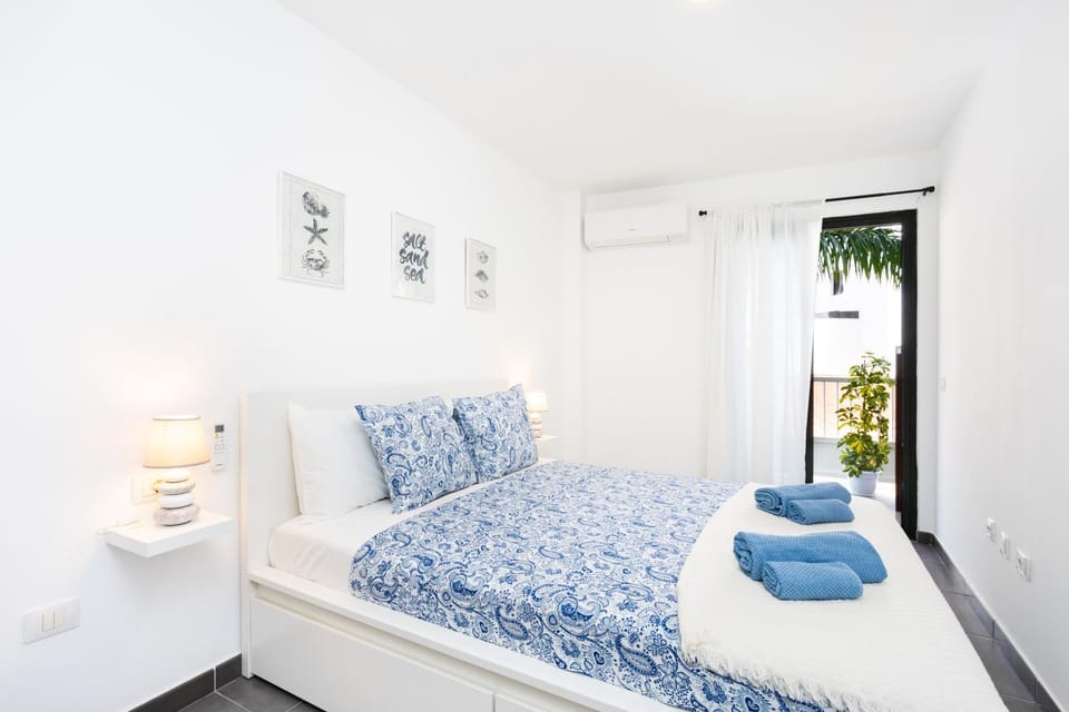 Bed, Balcony/Terrace, Bedroom, towels, wardrobe, air conditioner