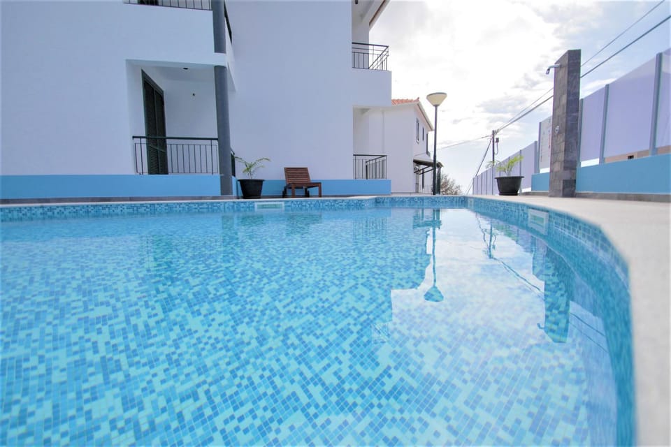 Property building, Off site, Swimming pool, sunbed