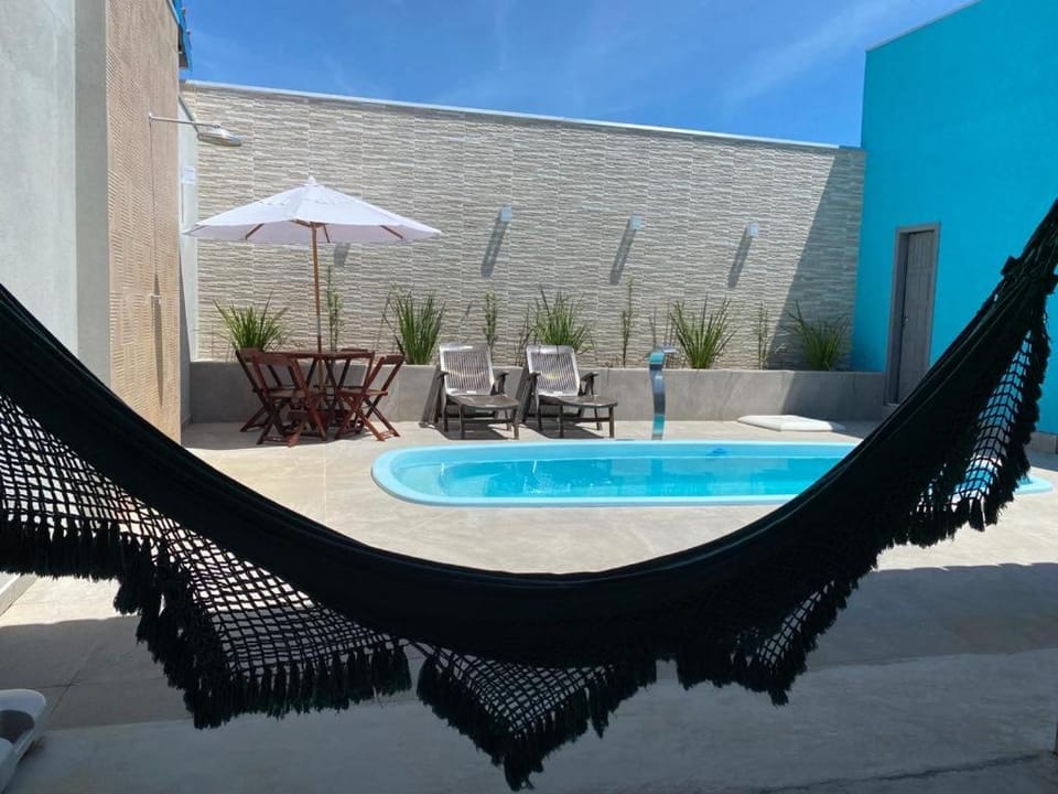 Casa com piscina e um quarto com ar split pé na areia a 50 metros da praia House in State of Bahia
