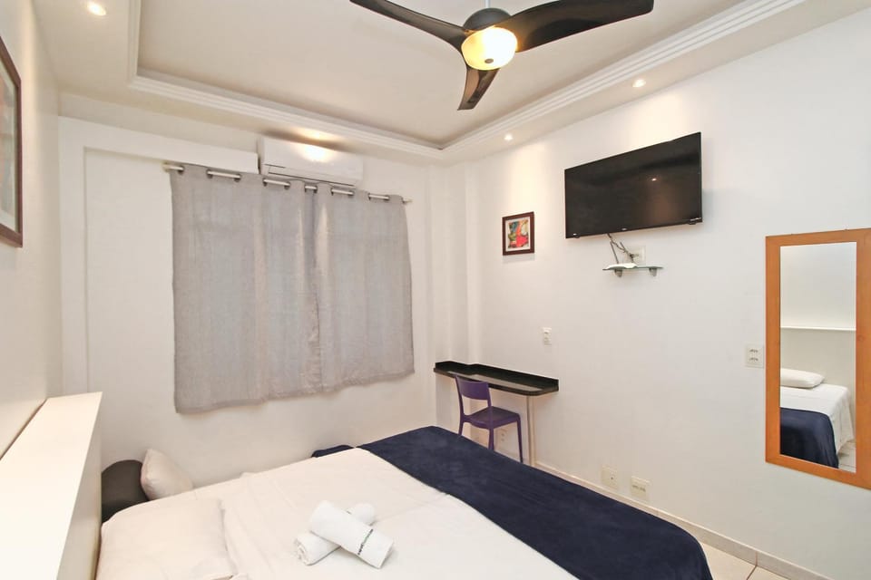 Bed, TV and multimedia, Bedroom, fireplace, hair dresser, towels, air conditioner