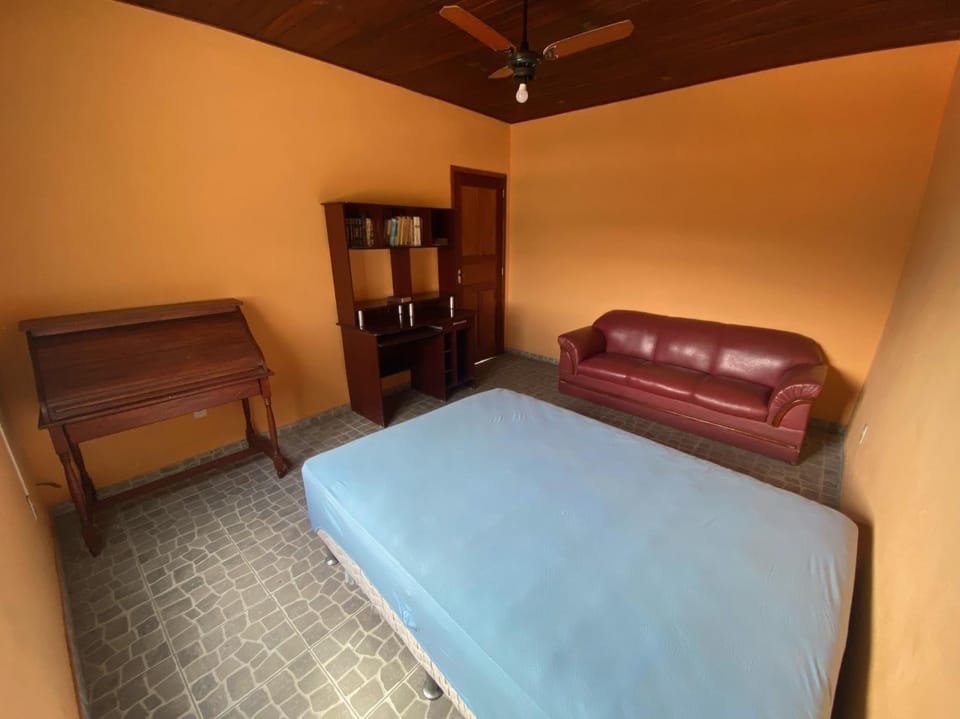 Bed, Seating area, Bedroom, fireplace