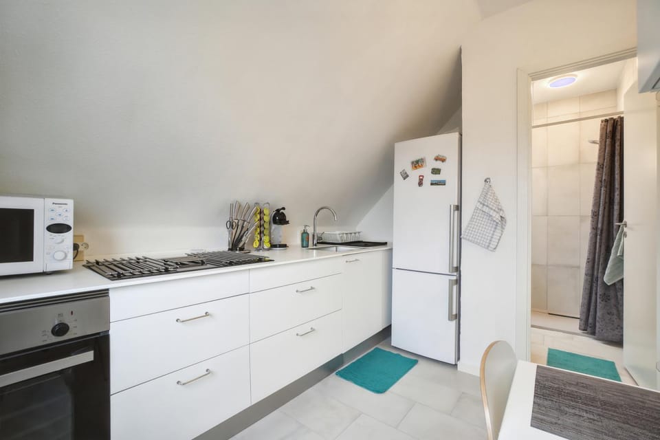 Kitchen or kitchenette, oven, toaster