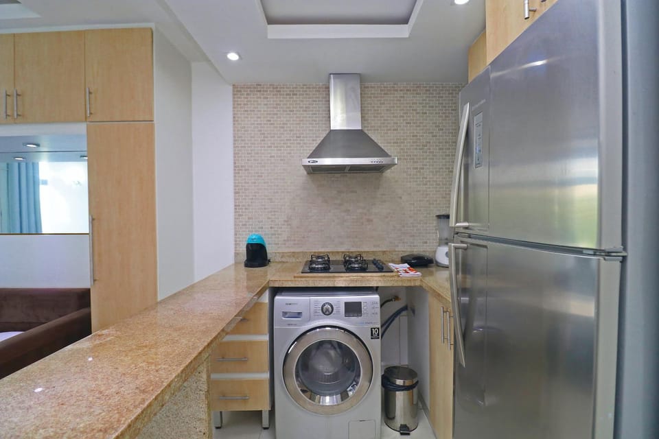 Kitchen or kitchenette, minibar, oven, stove, washing machine, kitchen