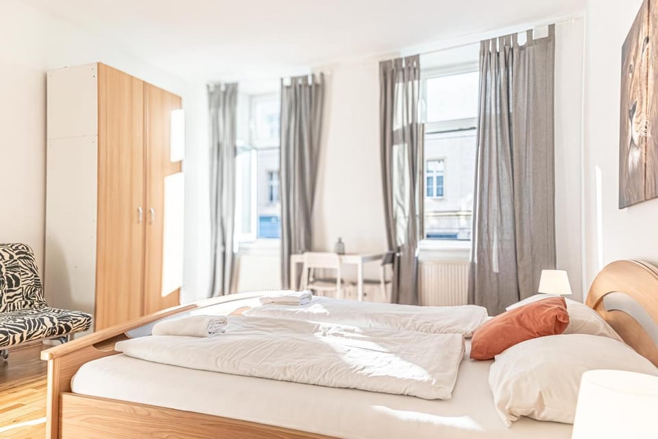 Bed, Seating area, Bedroom, towels, wardrobe