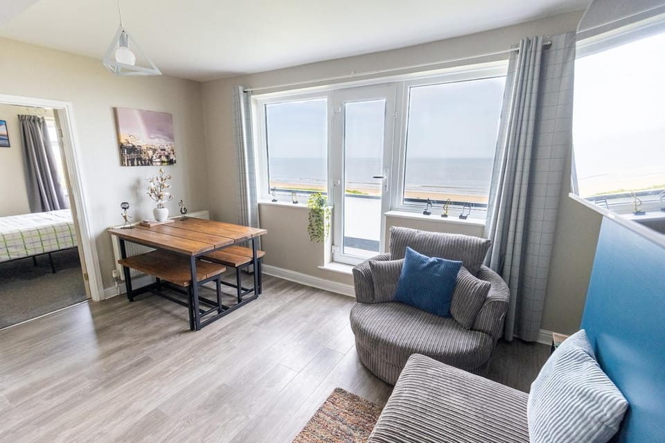 Bed, Natural landscape, View (from property/room), Living room, Seating area, Dining area, Bedroom