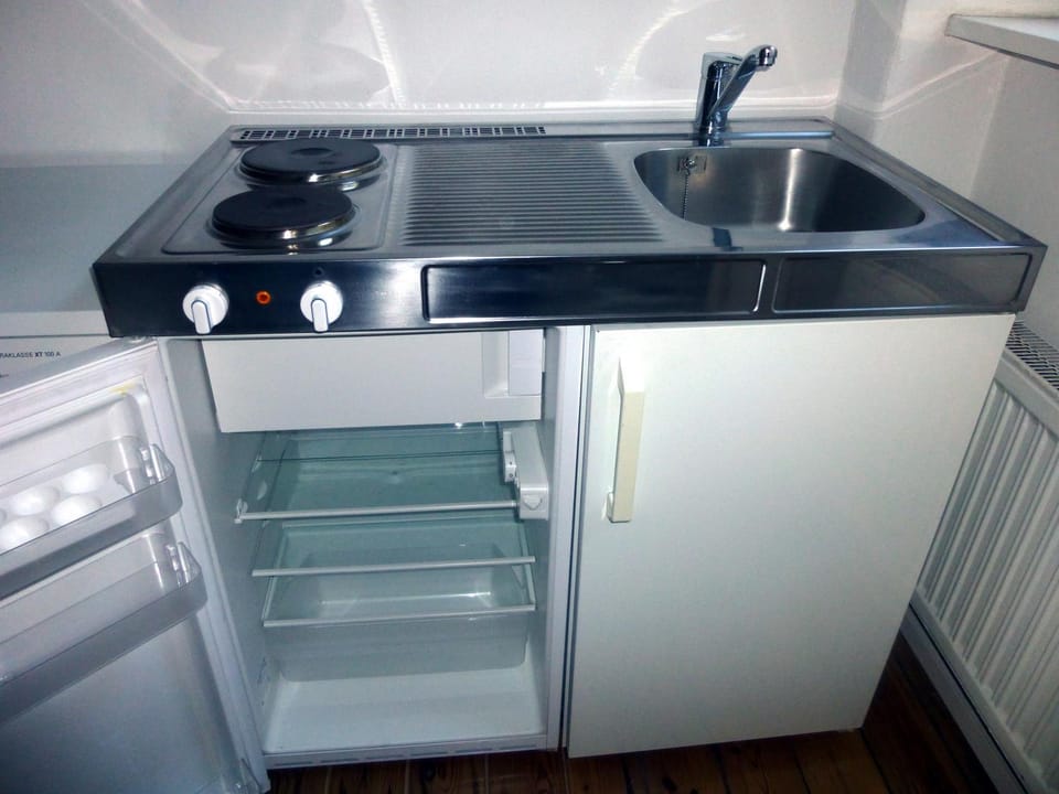 Kitchen or kitchenette, stove