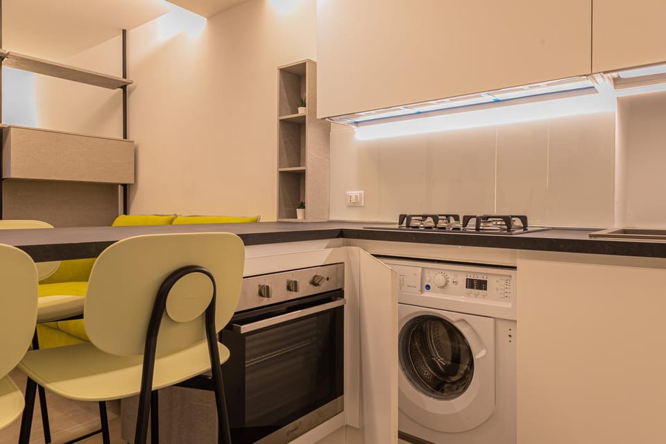 Kitchen or kitchenette, washing machine