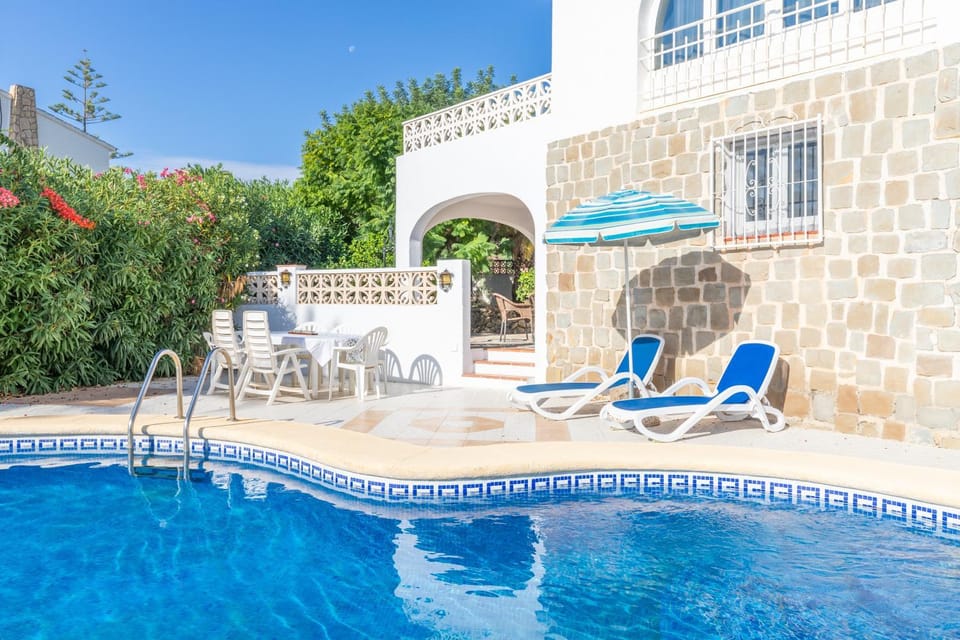 Property building, Living room, Swimming pool