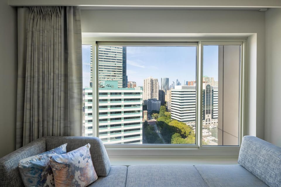 Bed, View (from property/room), Seating area, City view