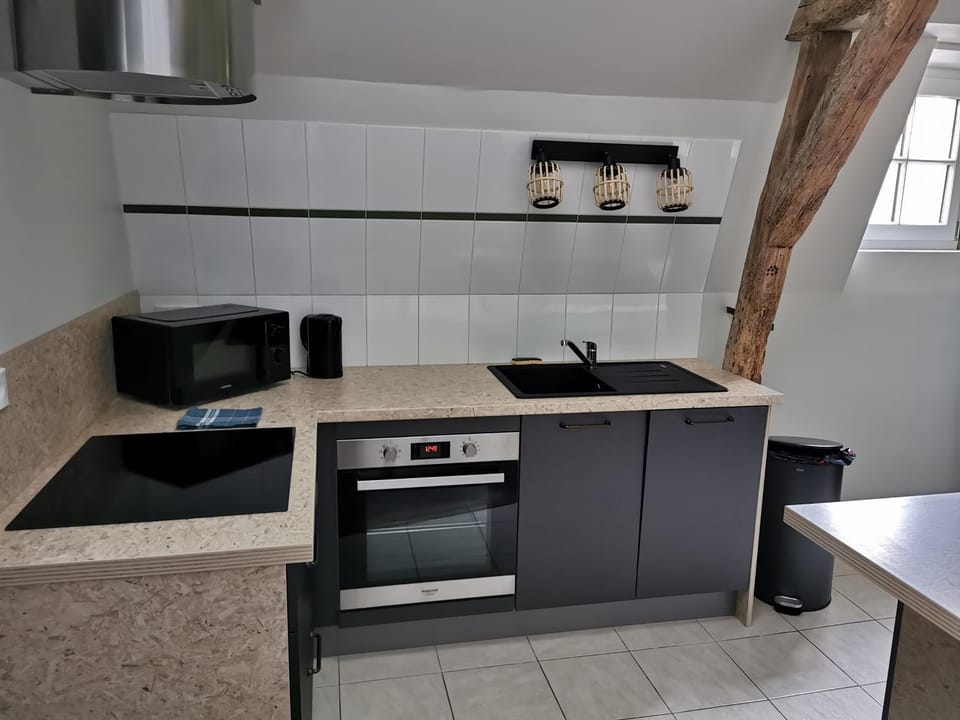 Kitchen or kitchenette, dishwasher, oven, stove, toaster