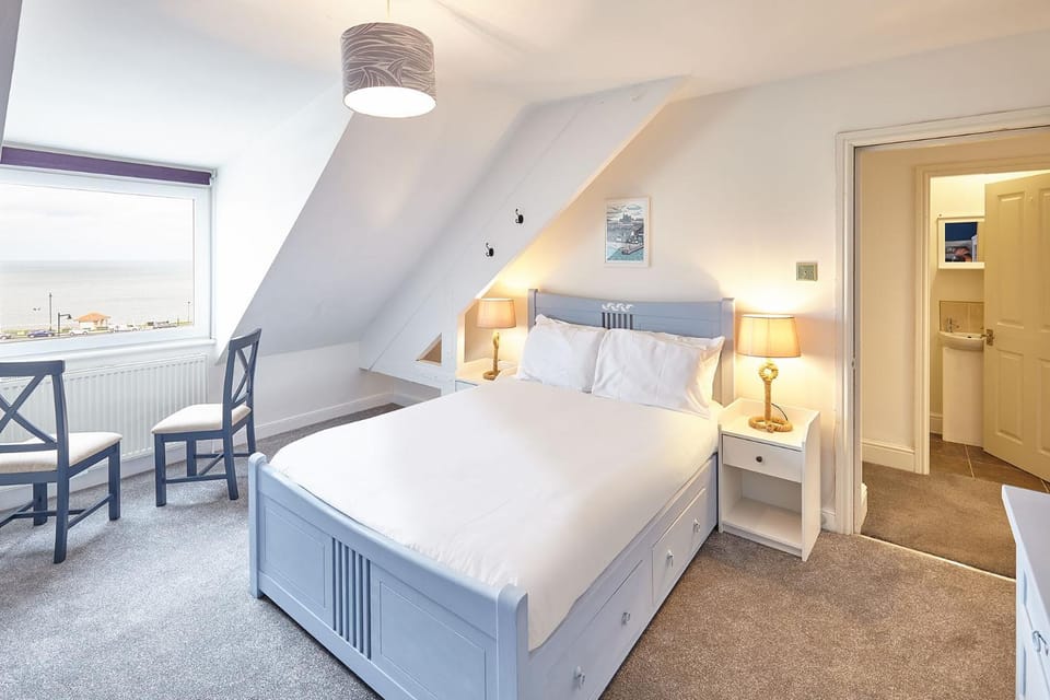 Bed, Seating area, Bedroom, Sea view