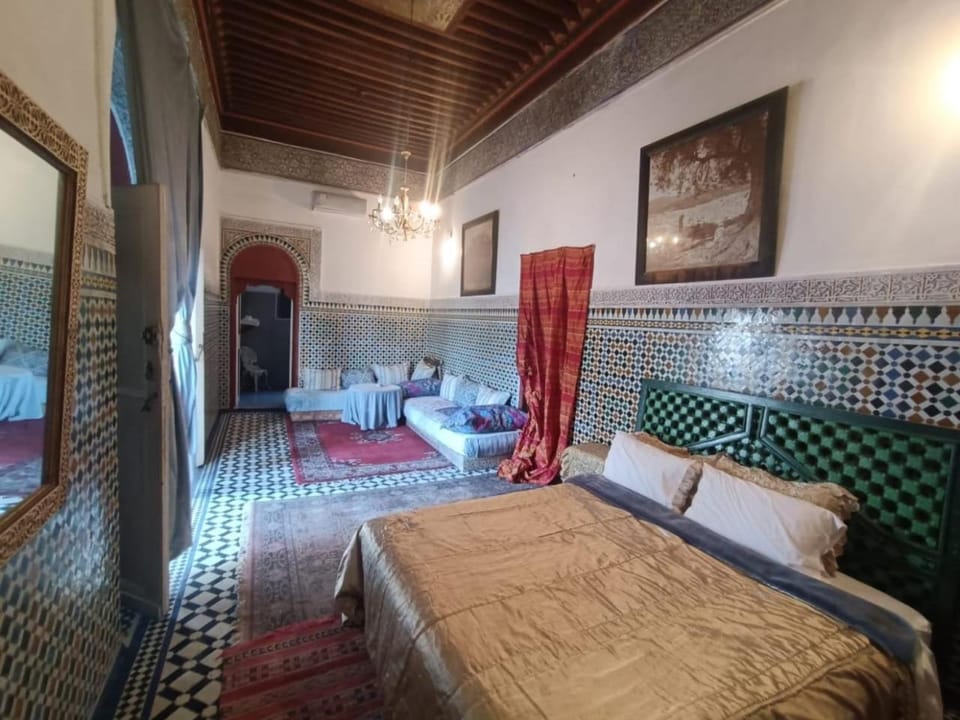 Bed, Seating area, Bedroom