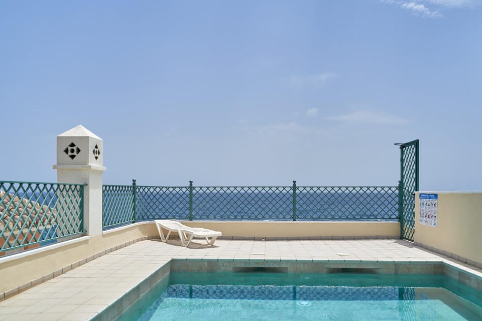 Property building, Living room, Swimming pool
