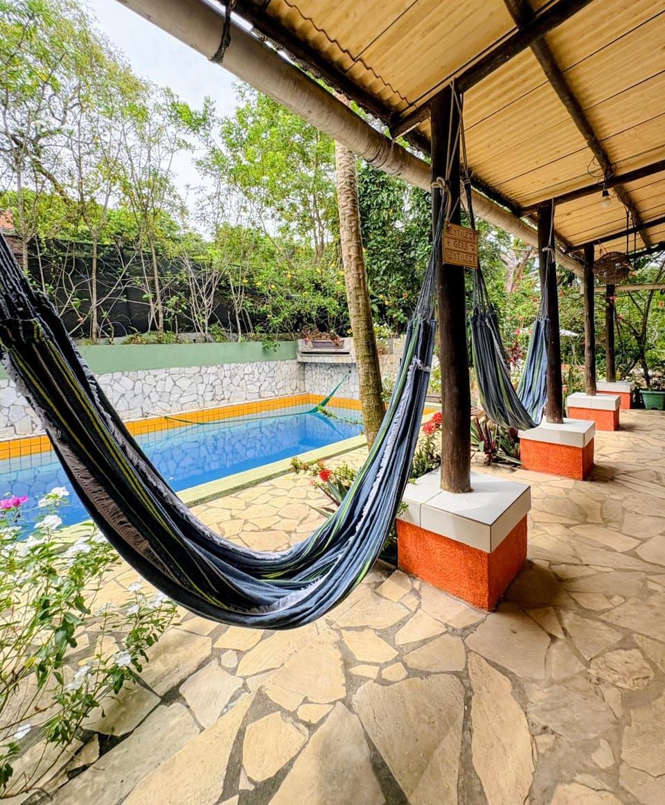 Property building, Patio, Spring, Day, Natural landscape, Garden, Garden view, Pool view, Swimming pool, sunbed
