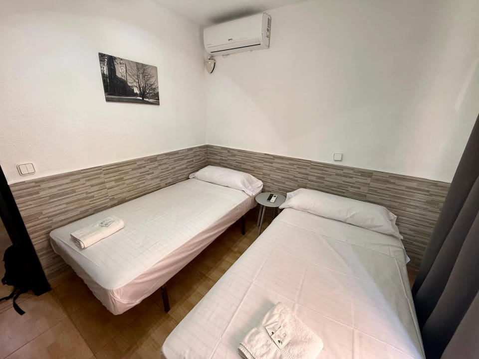 Bed, Photo of the whole room, Bedroom, towels, air conditioner