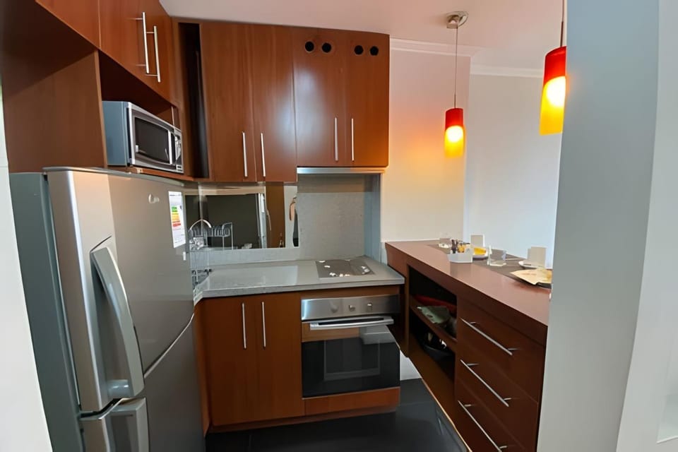 Kitchen or kitchenette, oven, stove