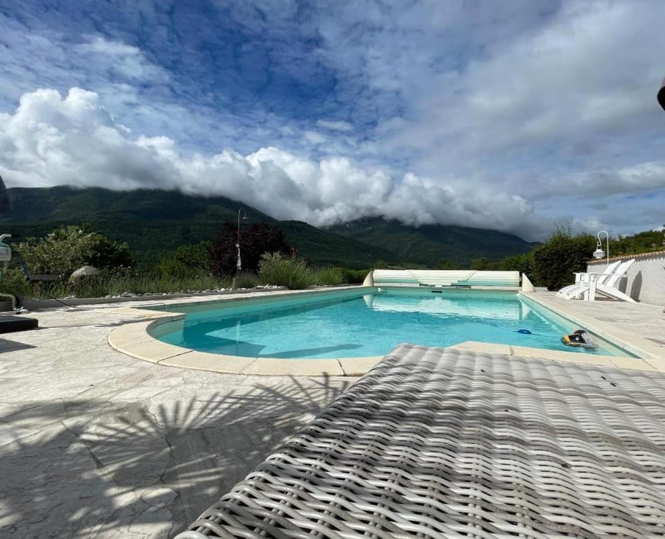 Day, Natural landscape, Mountain view, Swimming pool, sunbed