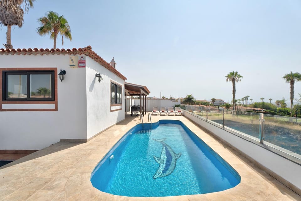 Property building, Living room, Swimming pool