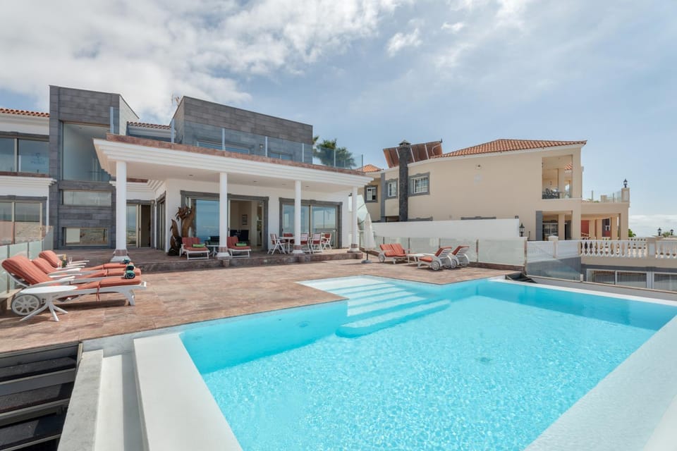 Property building, Living room, Swimming pool
