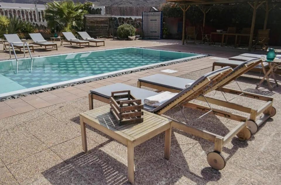 Property building, Living room, Swimming pool