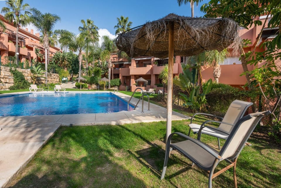 Property building, Living room, Swimming pool