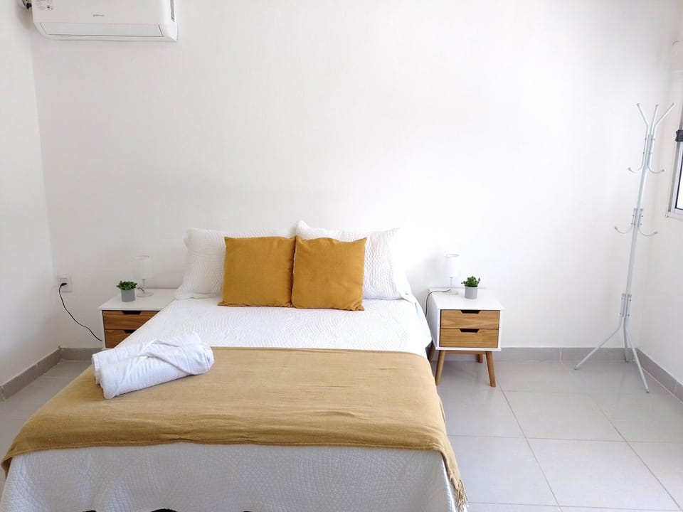 Bed, Photo of the whole room, Bedroom, towels, air conditioner