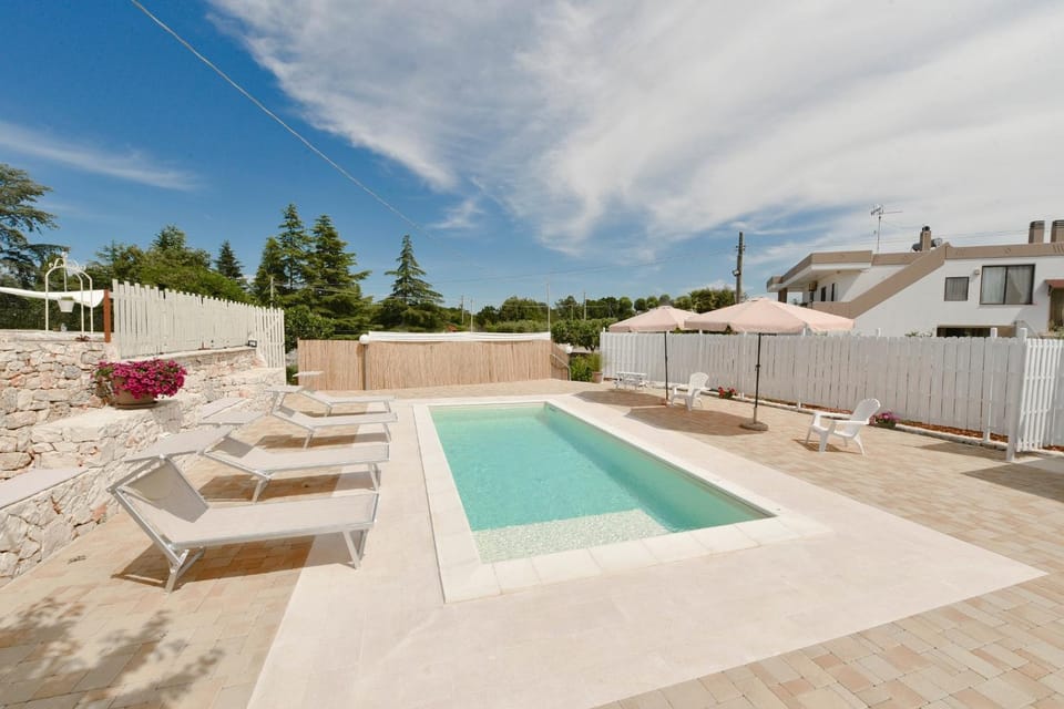 Property building, Living room, Swimming pool
