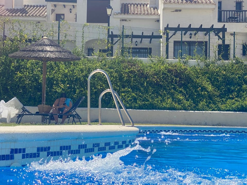 Swimming pool, sunbed