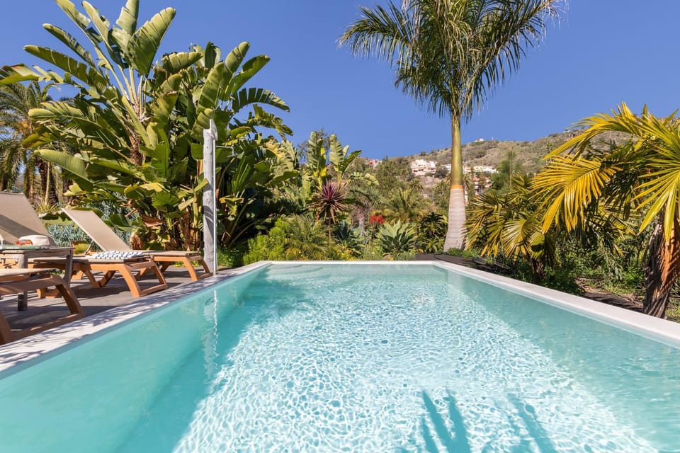 Property building, Living room, Swimming pool