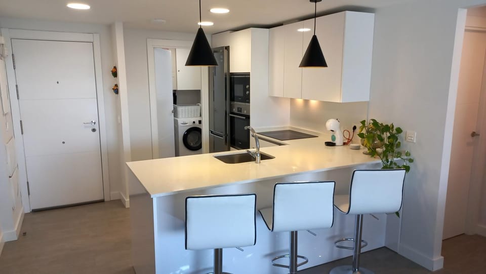 Kitchen or kitchenette, Dining area, dishwasher, washing machine