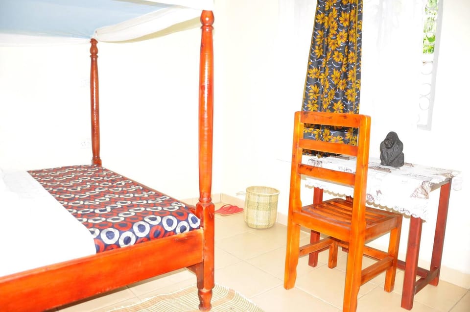 Bed, Seating area, Bedroom