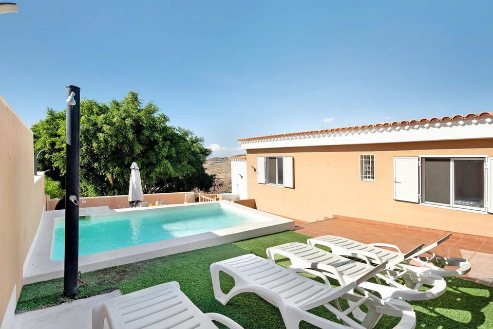 Property building, Living room, Swimming pool