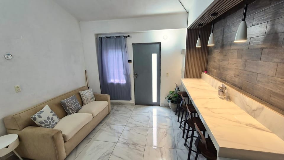 Kitchen or kitchenette, Living room, Seating area, Dining area