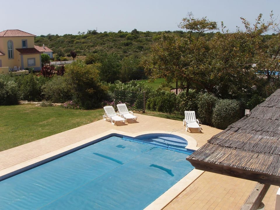Swimming pool, sunbed