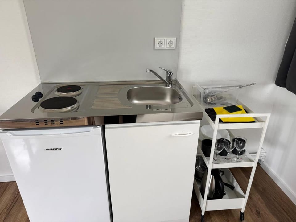 Kitchen or kitchenette, stove
