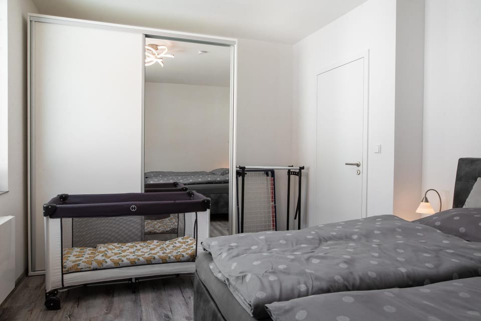 Bedroom, cot, wardrobe