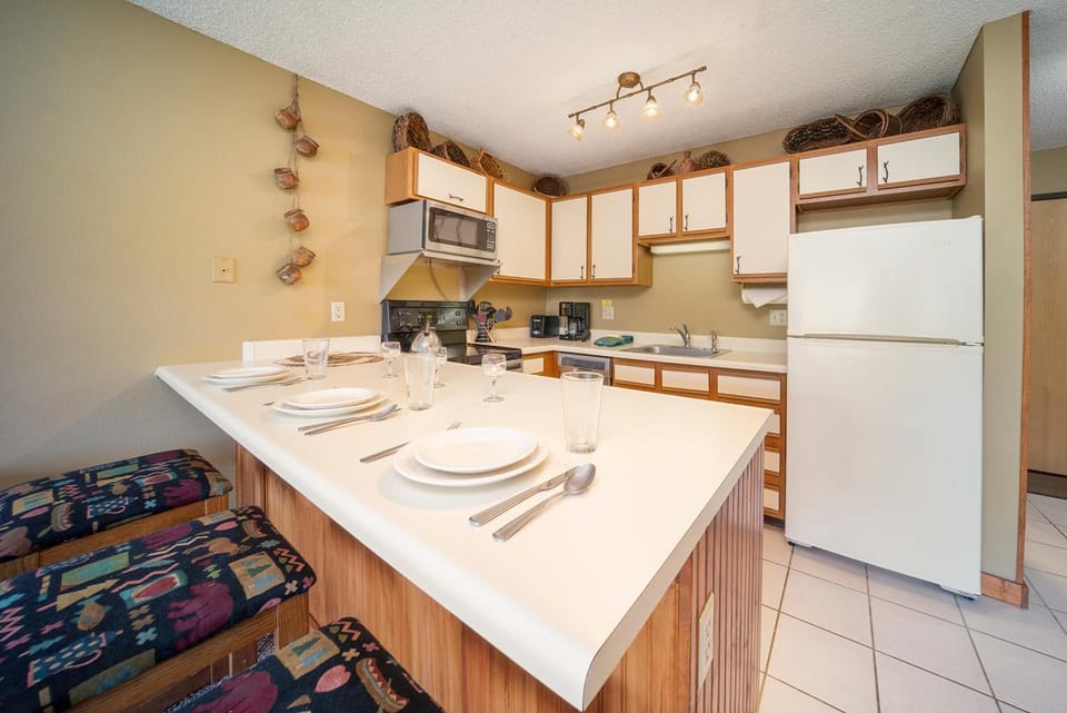Kitchen or kitchenette, Dining area, furniture, microwave