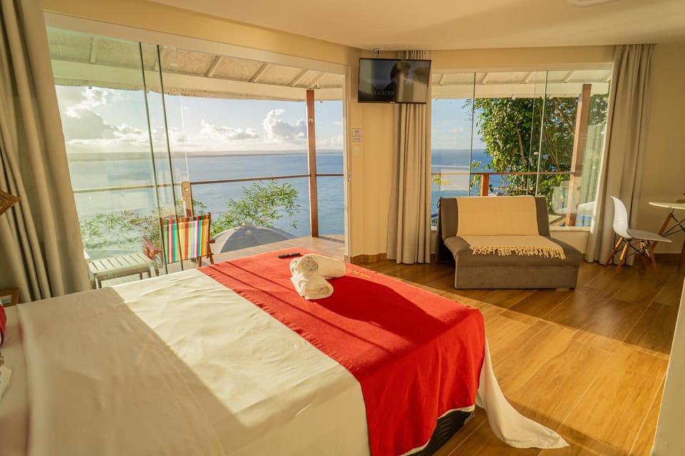 Bed, Natural landscape, TV and multimedia, View (from property/room), Balcony/Terrace, Photo of the whole room, Bedroom, Pool view, Sea view, Swimming pool, Sunset, towels