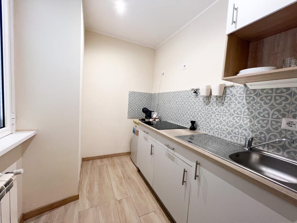 Kitchen or kitchenette, stove